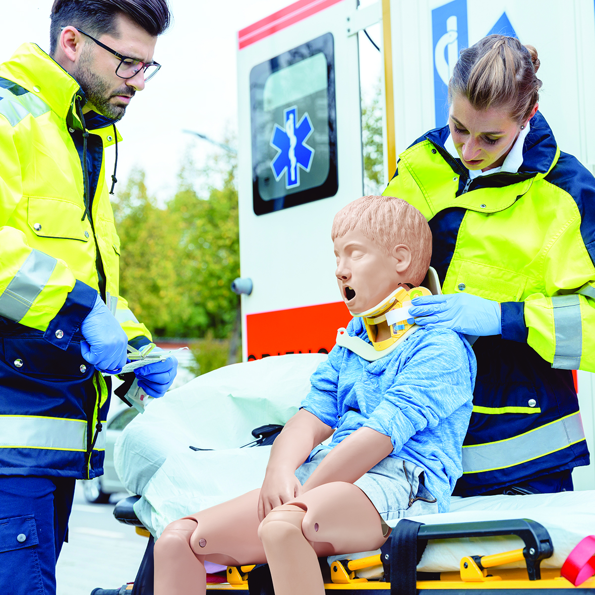 Child Crisis Manikin with paramedics