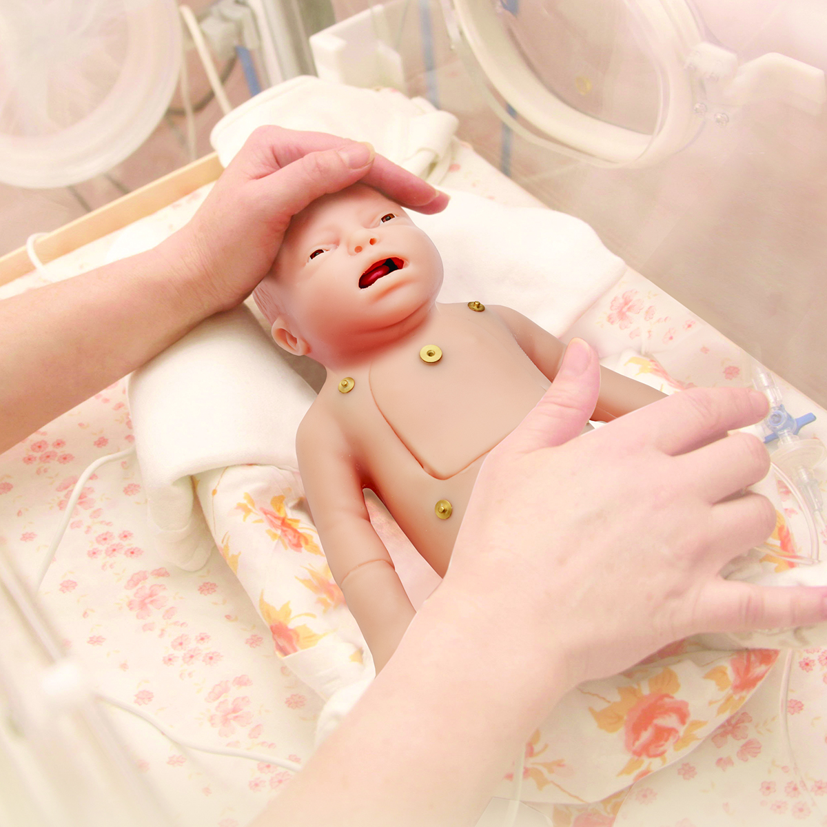 Charlie manikin in an incubator